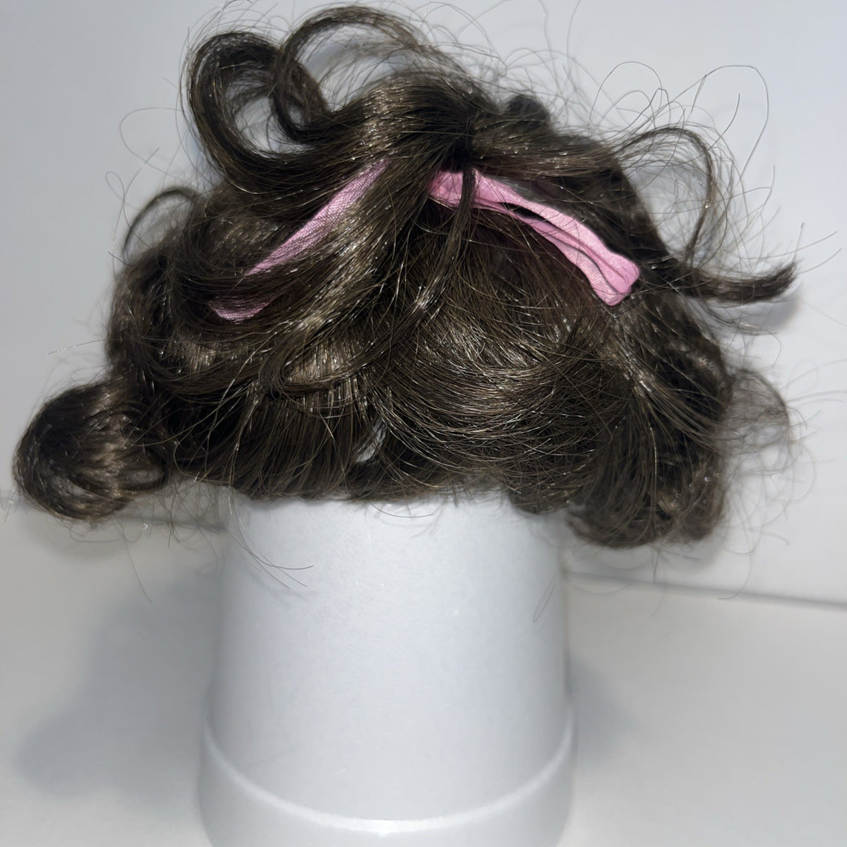 TALLINAâs Doll Wig 10â Stretchable Dark Brown Short Curly Pink Ribbon Ponytail