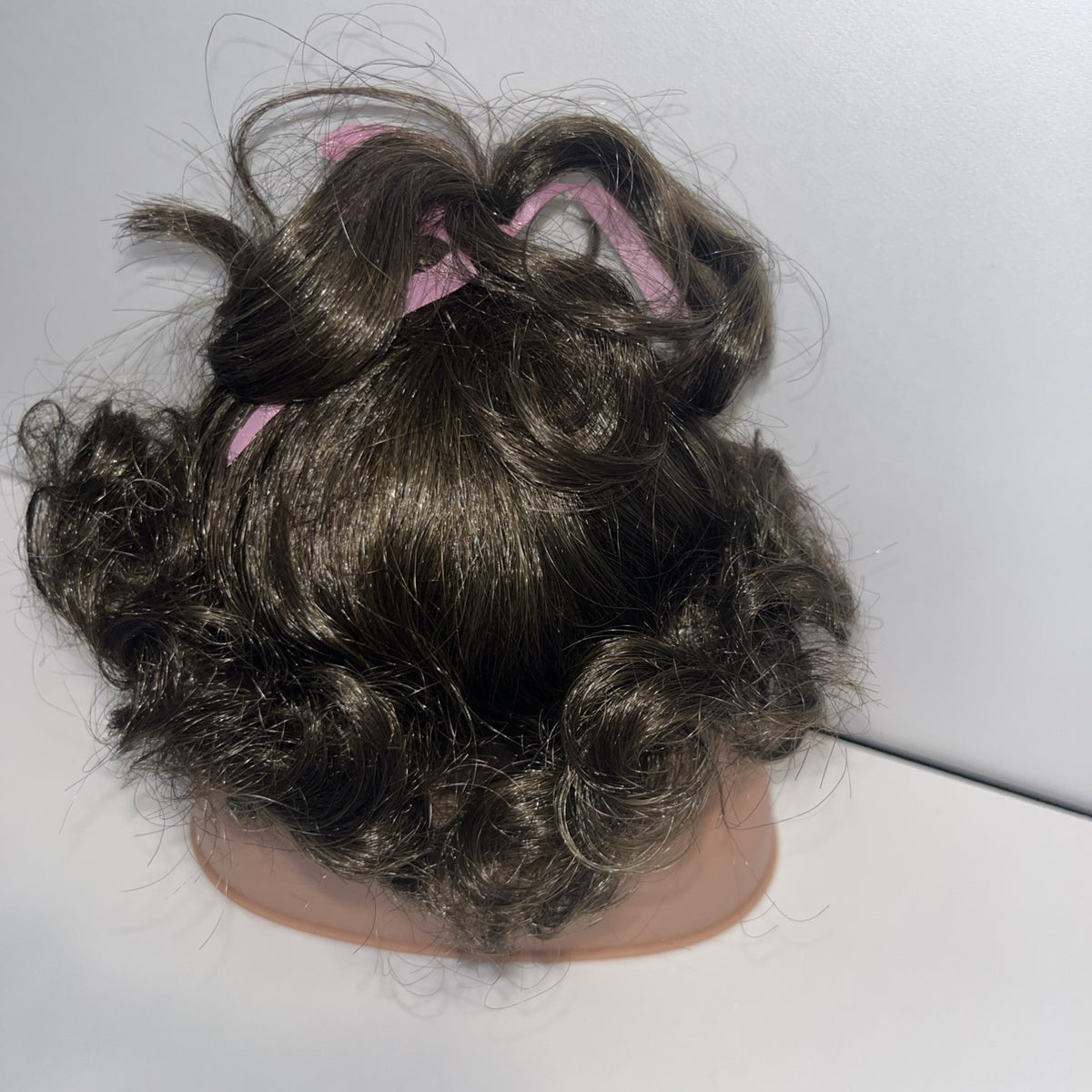 TALLINAâs Doll Wig 10â Stretchable Dark Brown Short Curly Pink Ribbon Ponytail