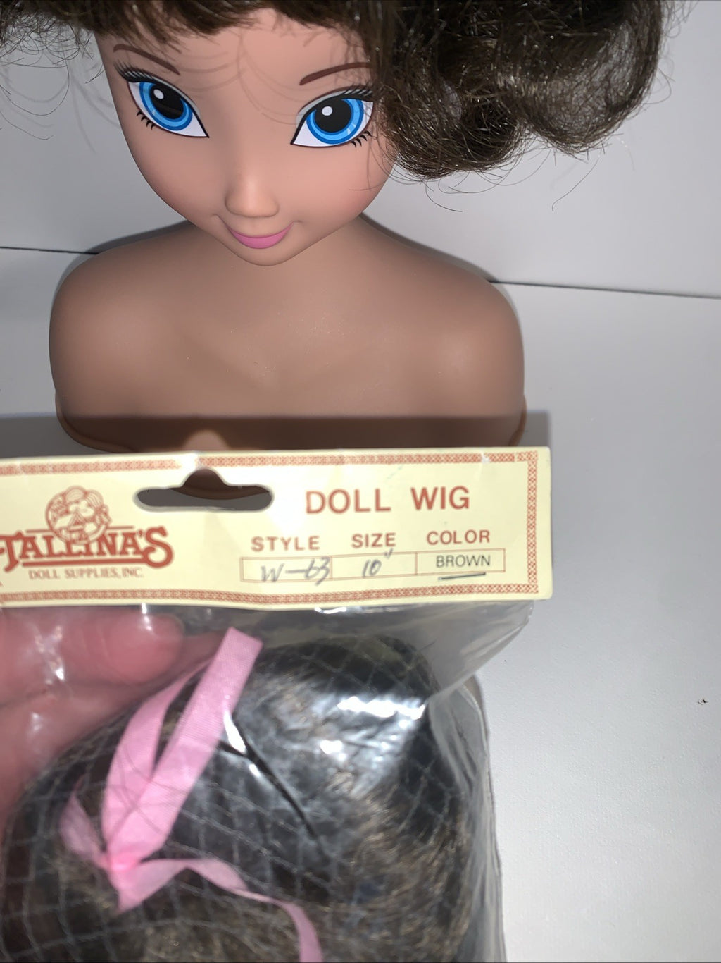 TALLINAâs Doll Wig 10â Stretchable Dark Brown Short Curly Pink Ribbon Ponytail